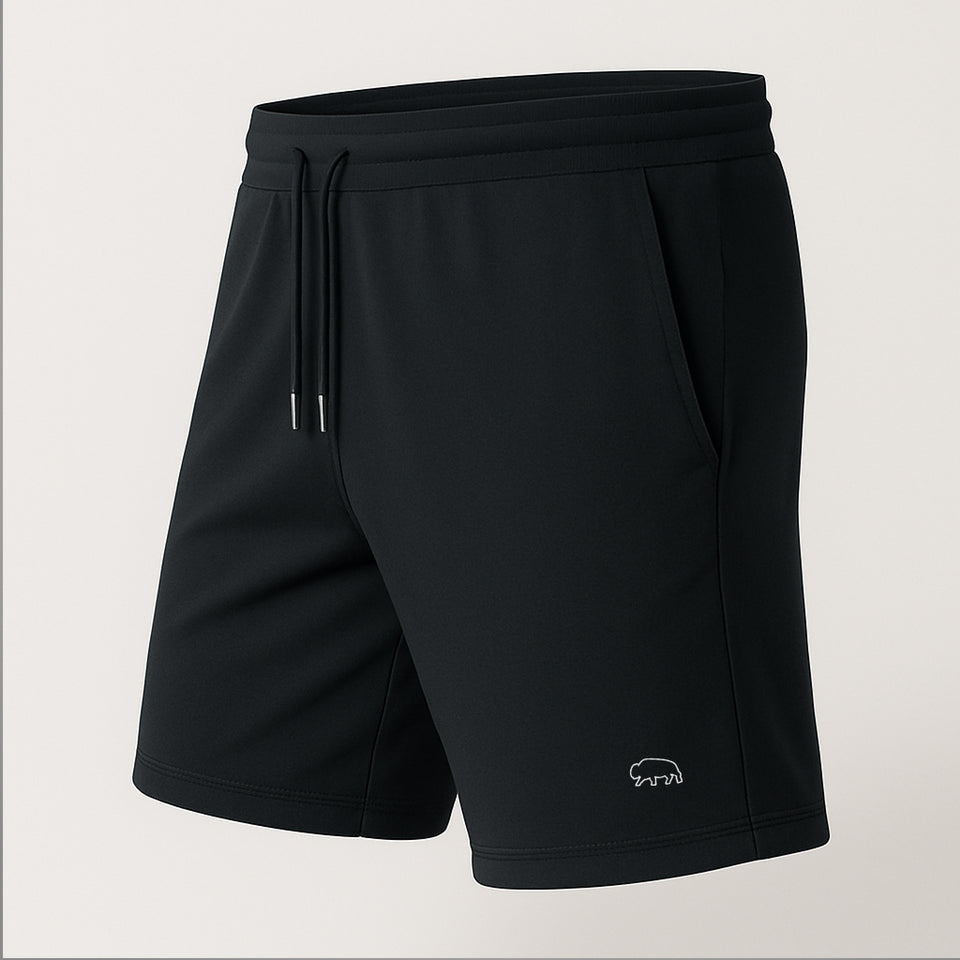 Black Breitung shorts with a small bison outline logo on a light gray background